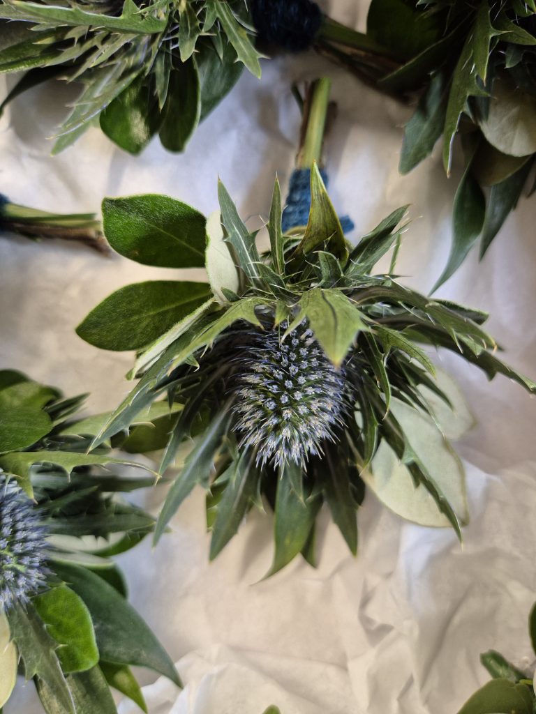 Weddings. thistle buttonhole