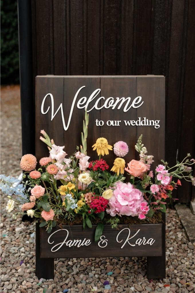 welcome sign with flowers