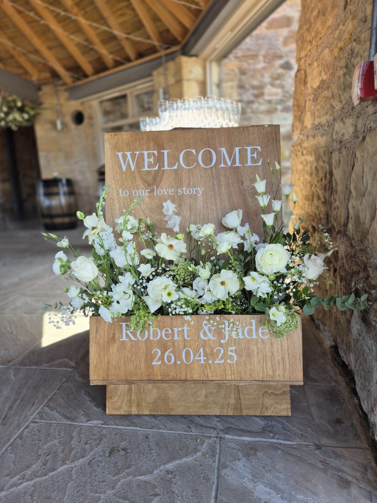 welcome sign flower box