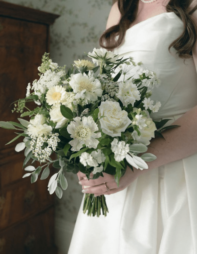 white wedding bouquet of garden flowers and foliages