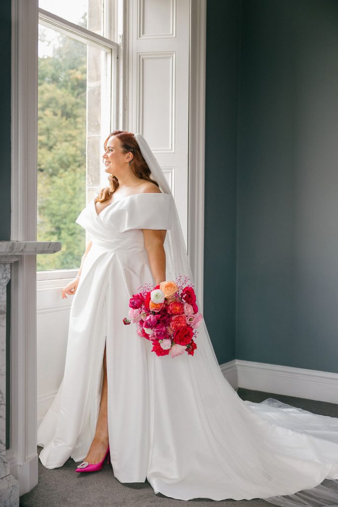 A bright pink and colourful wedding at Kinnettles Castle