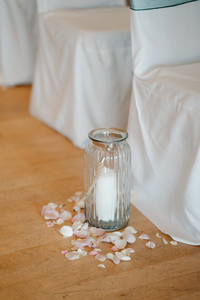 invercarse-hotel-dundee-wedding-fraoch-floral-design 4 - Fraoch Floral Design Dundee wedding. A wedding at the Invercarse Hotel. Aisle decor- lantern with petals